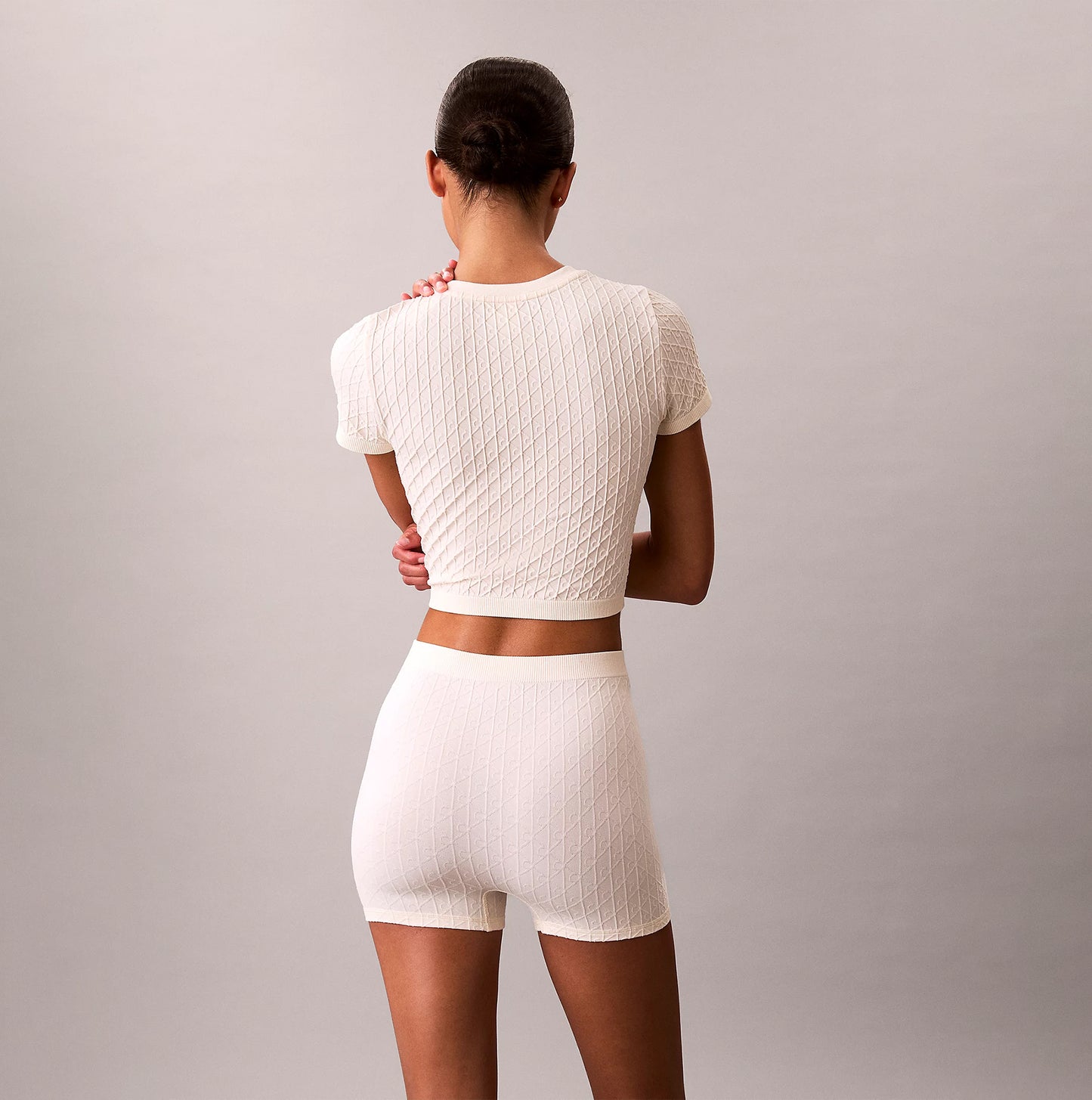 Calvin Klein SEAMLESS Womens Printed CK Knit T-Shirt Ivory